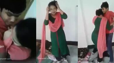 Young bihari boy kissing shy girlfriend front friends